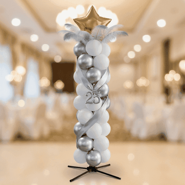 PilaMania balloon column decorated for 25th wedding anniversary with silver ribbon, golden star topper and anniversary number 25