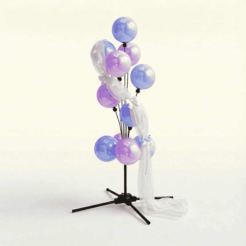 Dreamy gender reveal balloon fountain in soft pastel tones with white tulle streamers and transparent accents