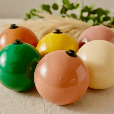 Balloon pillars and arches in various colours, built from the click system