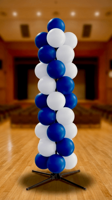 Overview of a complete graduation ceremony setup with PilaMania balloon columns and arch in school colours