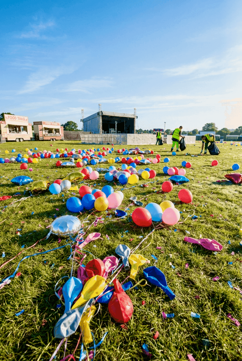 Landfill with used balloons after an event