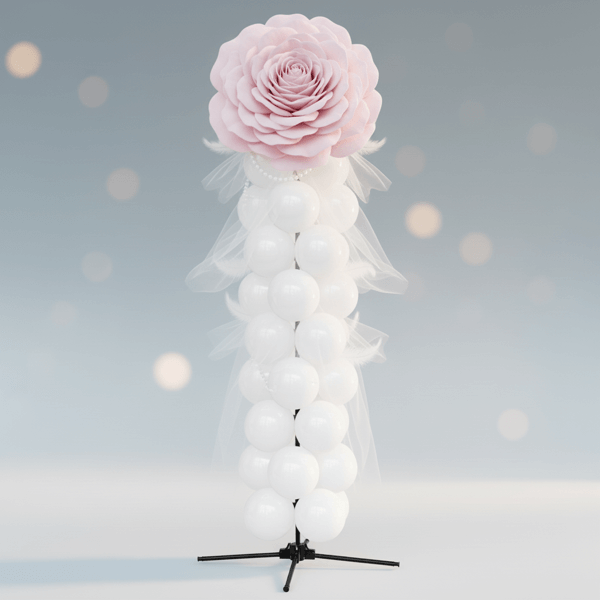 Wedding balloon pillar with fresh roses, tulle, and feathers